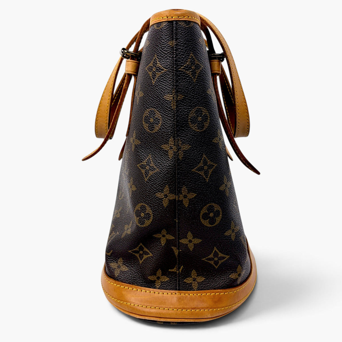 Monogram canvas bucket bag with side leather ties and tan leather edging