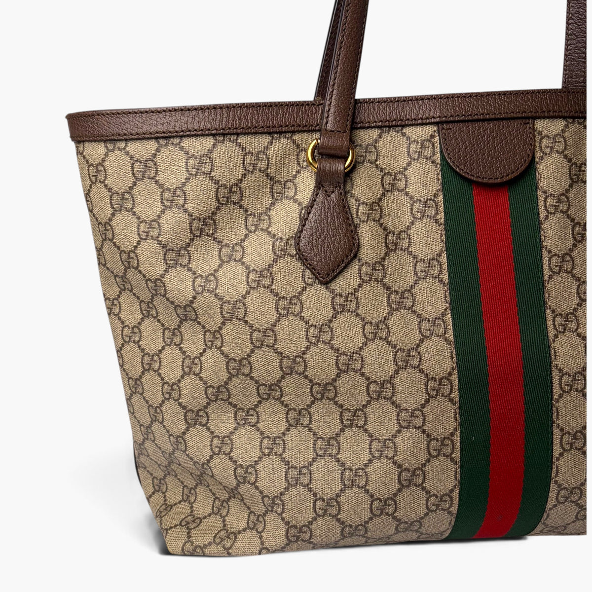 GG monogram tote with brown leather top, handles, and green-red web stripe