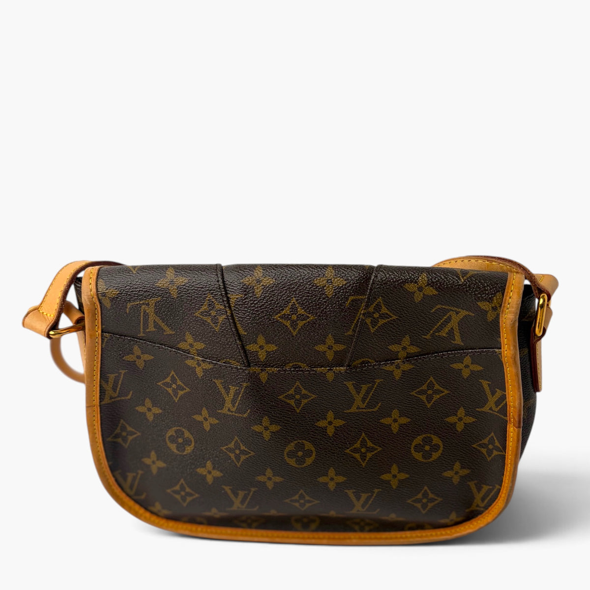 Monogram shoulder bag with tan leather trim and crossbody strap