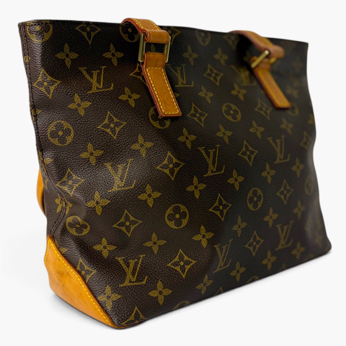 Cabas Piano monogram canvas tote bag side view with tan tab and handle