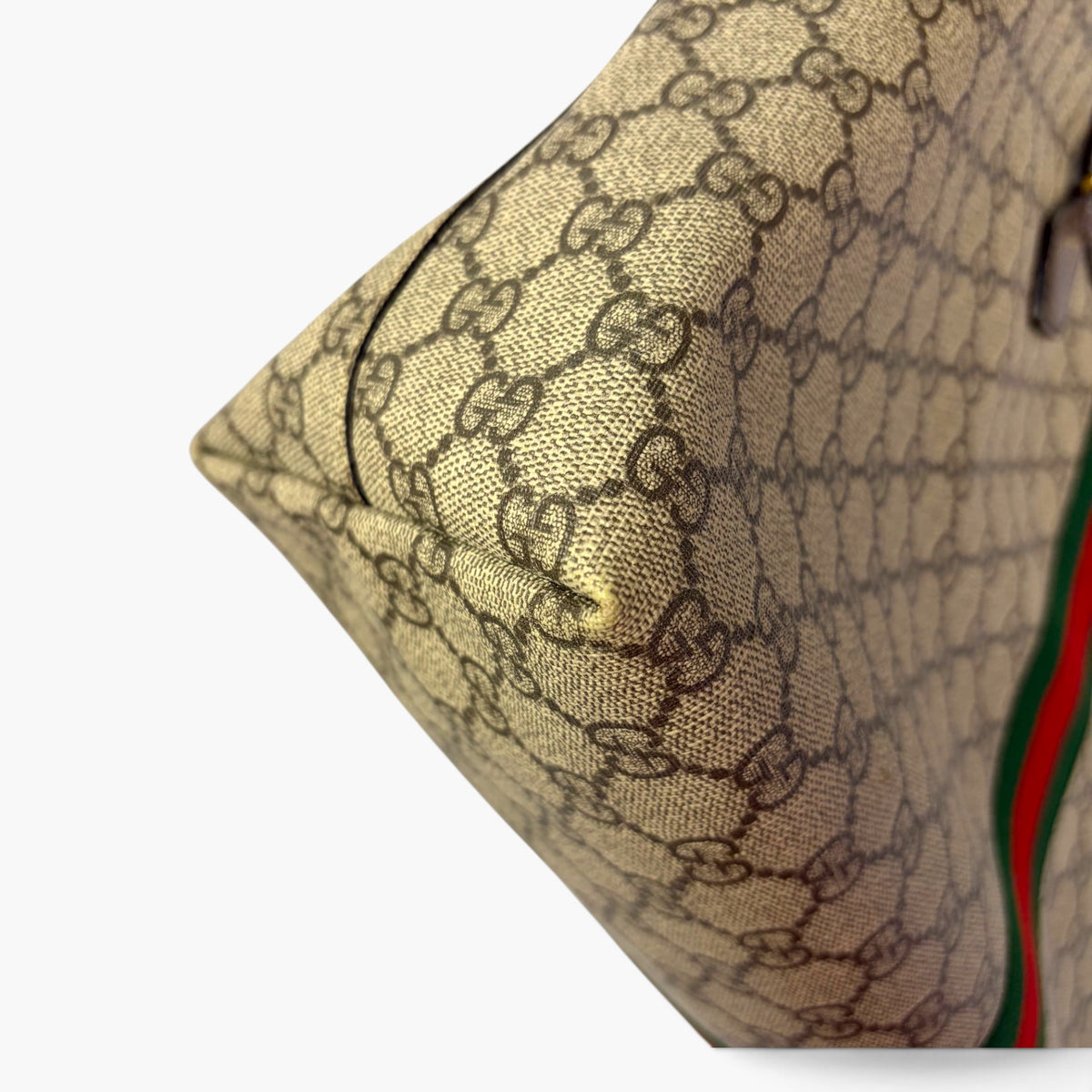 Tote bag bottom side with GG pattern canvas and textured leather trim