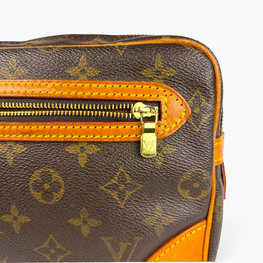 PURSuaded Louis Vuitton Marly Dragonne GM monogram canvas clutch with gold-tone zip pocket and vachetta leather trim